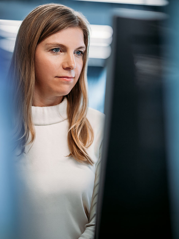 Woman looking at computer. 